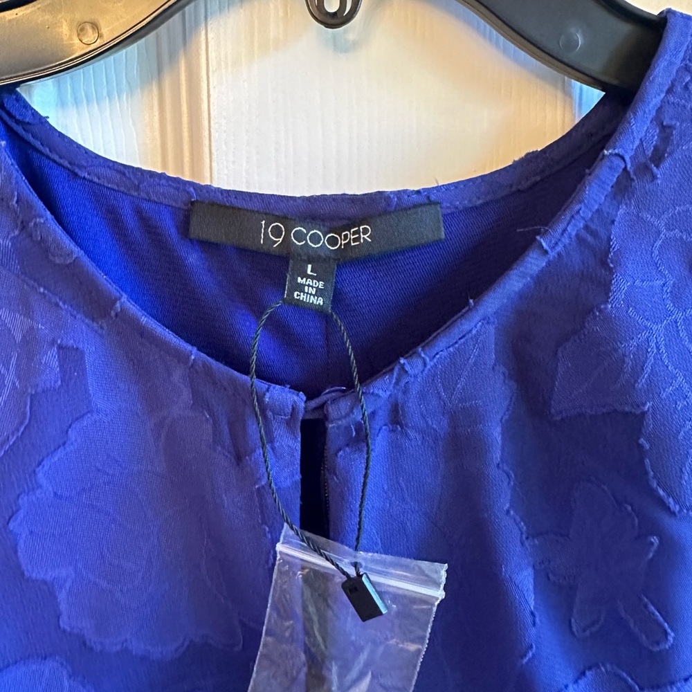 Beautiful top, new with tag.
